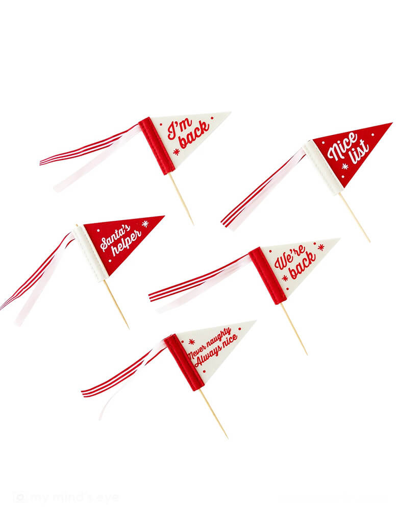 Momo Party's Elf on the shelf pennant flags by My Mind's Eye. Included are 5 white and red felt pennant banners with words like: "I'm Back," "Santa's Helper," "Nice List," "We're Back," "Never Naughty Always Nice" that will add holiday fun when your loved ones are on the hunt for Santa's helpers next adventure in your home this December.