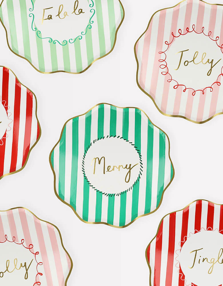 Momo Party's 8.5 x 8.5 inches Christmas striped side plates by Meri Meri. Come in a set of 8 in 4 different colors of red, pink, mint, and green with Jingle, Fa La LA, Merry, and Jolly words on them, these vintage inspired designs with gold foil details, with fun messages, will instantly add style to your celebrations over the holidays.