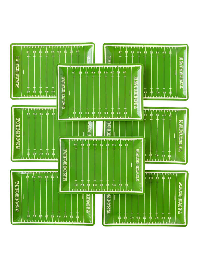 8 of Momopartys's 7.25" x 11" football field shaped large plates by My Mind's Eye. These football field paper plates are feature a grid iron design that are the perfect way to make sure that your guests will have plenty of treats from kick off to the final whistle! They're perfect for a football watching party, a super bowl party, or a tailgate party.