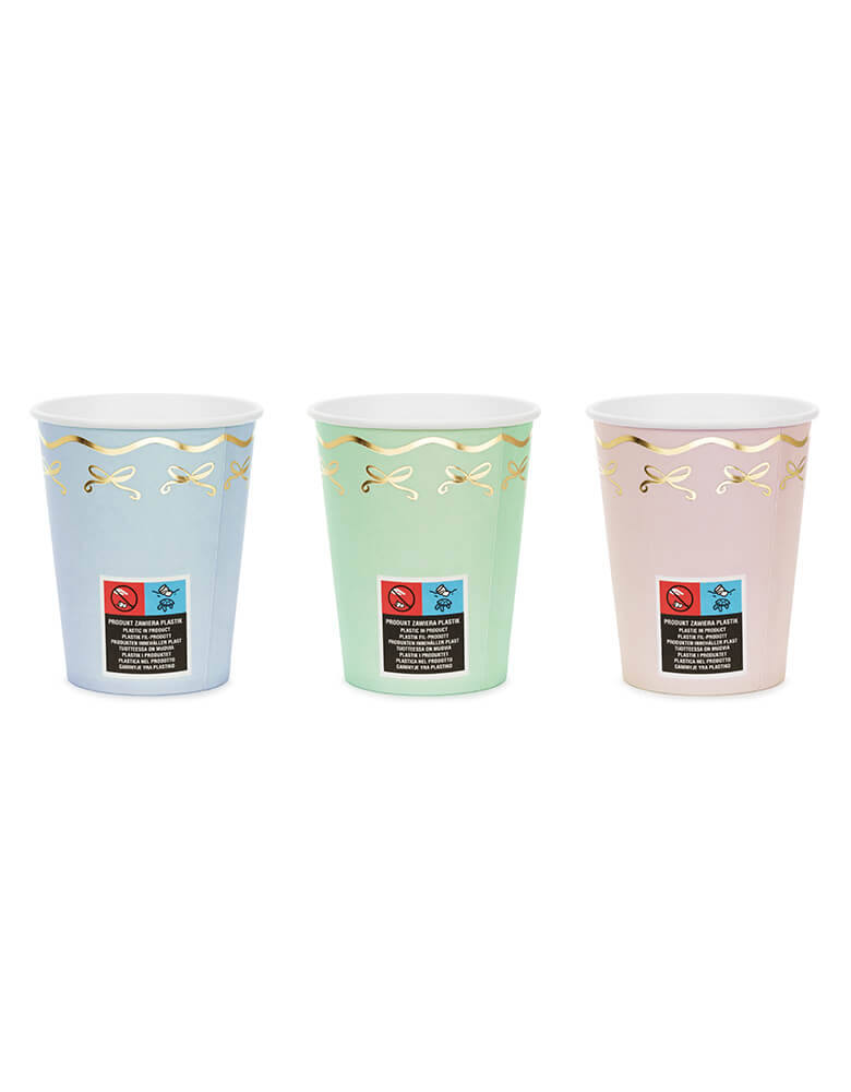 Momopartys 7.4 oz Pastel Coquette Bow Cups by Party Deco. Comes in a pack of 6 party cups in 3 pastel colors, add an elegant touch to your party with these gorgeous pastel coquette bow cups. These charming paper cups feature soft pastel colors and a delicate gold foil coquette bow design. Perfect for any celebration, these cups are sure to impress your guests.