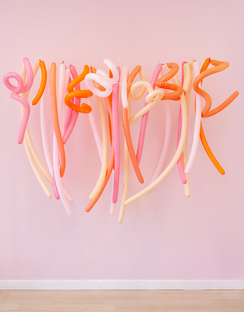 Momopartys Trick or Treat Whimsy Long Balloon Backdrop Kit. Assorted 260Q long modelling latex balloons in orange, matte pink, blush and rose