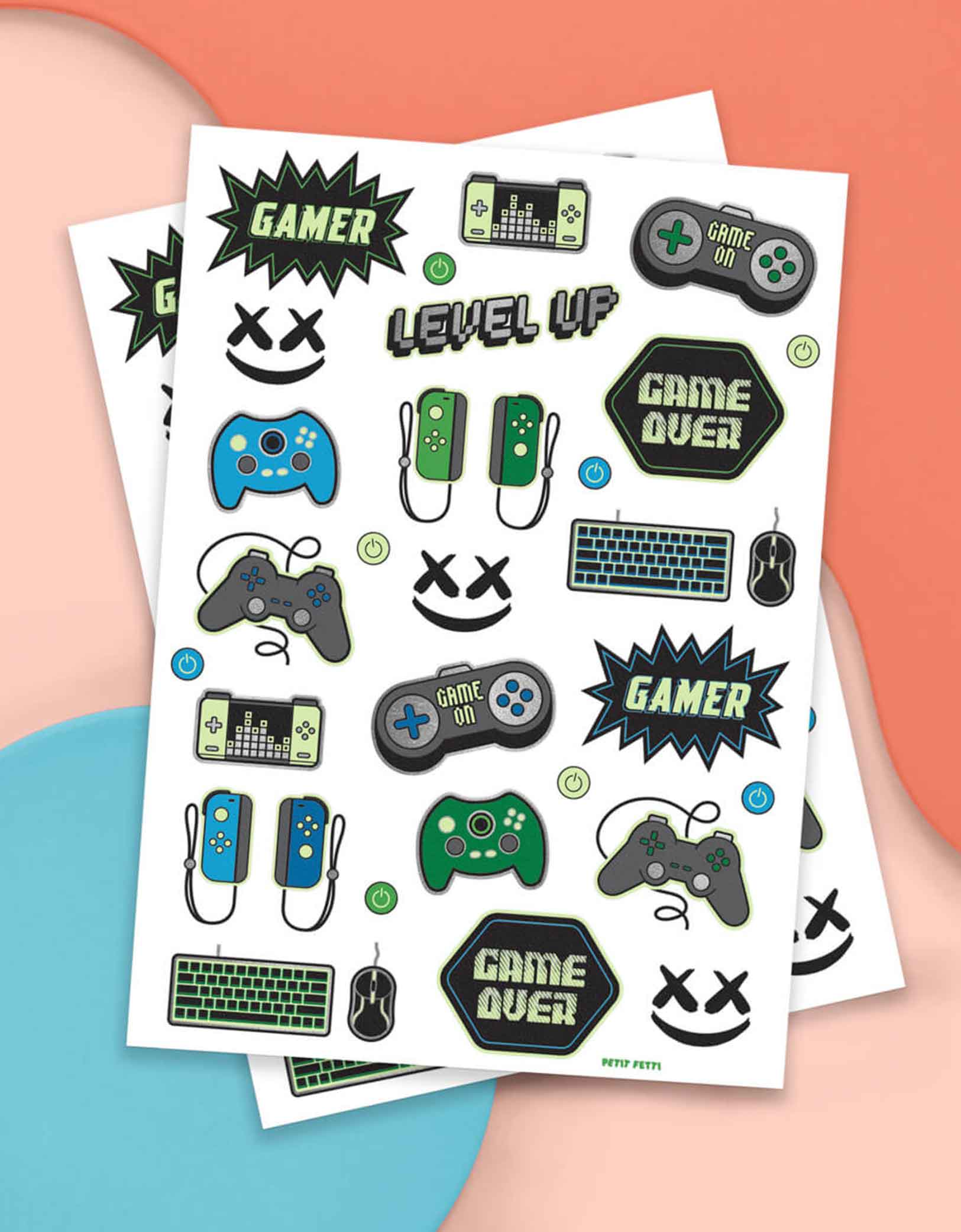 Video Gamer Glow in the Dark Kids Temporary Tattoos by xo, Fetti. Comes in a set of 40 tattoos, these glow in the dark video game temporary tattoos are the perfect kids after school activity or a video game themed party accessory! 40 designs including game controllers, game devices, level up, game over signs means no gamer gets left behind - call all the players, its game on!