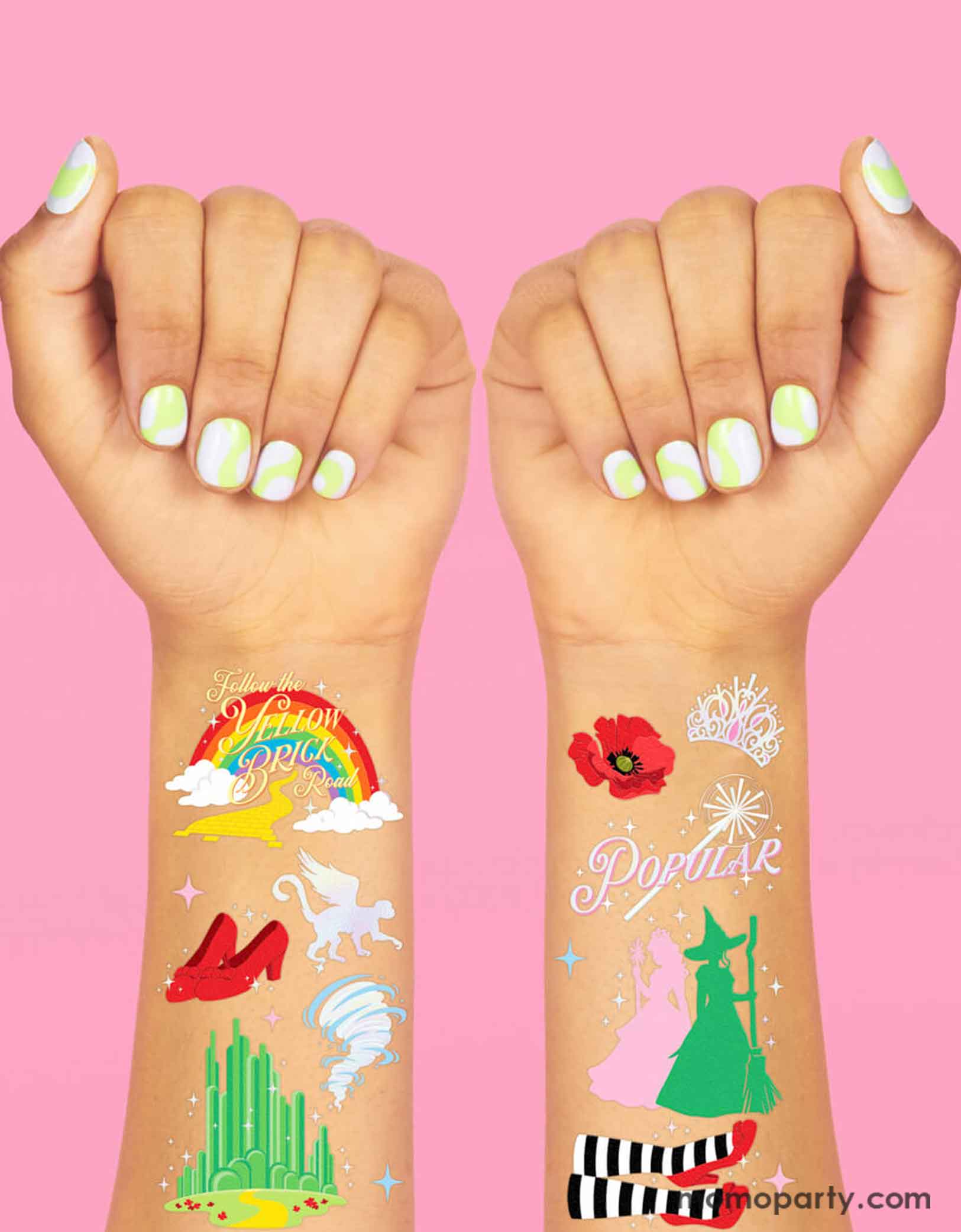 Two arms wearing Momopartys's Emerald City Wicked Witch Temporary Tattoos by Xo, Fetti. Featuring green and pink witches, red heels, rainbows, emerald city and magical icons inspired by the Wizard of Oz. These temporary tattoos are perfect for a Wicked themed birthday party celebration!