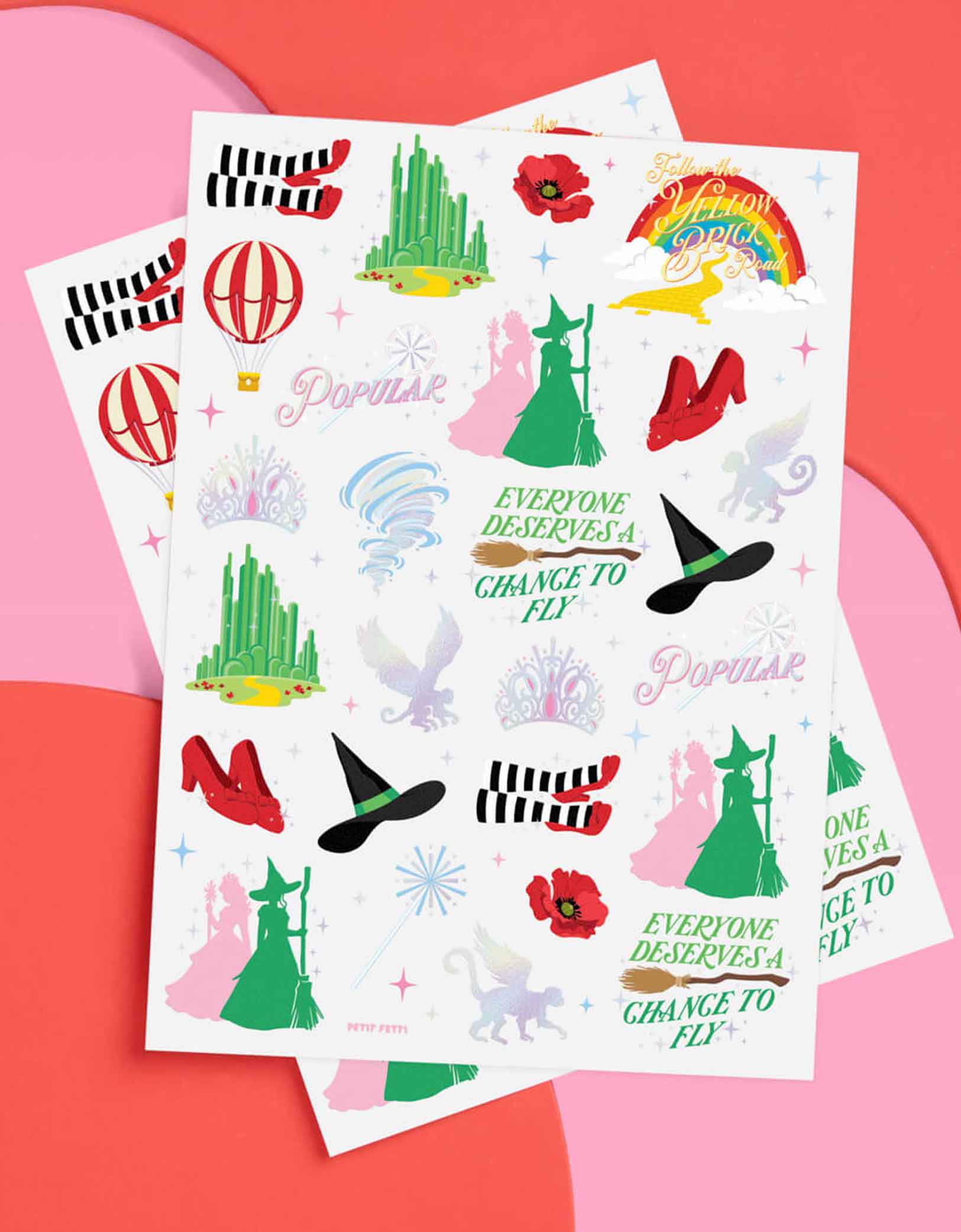 Momo Party's Emerald City Wicked Witch Temporary Tattoos by Xo, Fetti. Featuring green witch hats, broomsticks, and magical icons inspired by the Wizard of Oz. Perfect for a Wicked themed birthday party celebration!