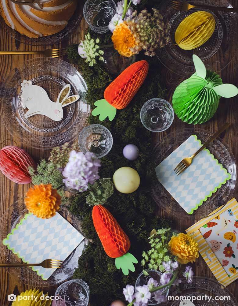 A beautiful rustic Easter table decorated with lots of spring flowers and honeycomb carrot and Easter egg decorations as centerpiece, with Momopartys's 5 x 6.3" bunny napkins by Party Deco, it makes a great inspiration for an adorable kid's Easter tableset.