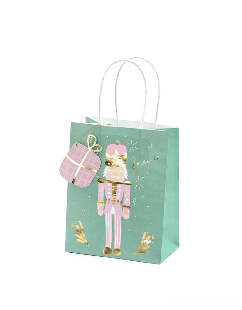 Party Deco Christmas Gift Bags, a gift bag shaped gift tag on the pink nutcracker designed green paper bag, with gold foil sprinkler and Falalala wording