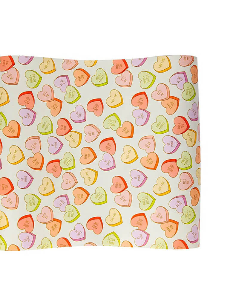 Momo Party's 30" x 120" conversation hearts table runner by My Mind's Eye, great for Valentine dessert tables, anniversary dinners, and parties! It makes setting and cleaning up a festive table easy, especially when you layer it with some of Momopartys's cute Valentine plates and napkins!