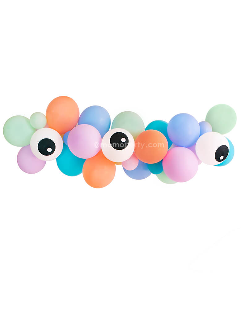 Little Monsters Balloon Garland by Momopartys. Assorted 11” (large) & 5” (small) latex balloons garland kit in Pastel matte mint, Pastel matte purple, coral, pale blue, caribbean blue and eyeball print latex balloons. This colorful and fun design are perfect for a modern halloween themed party, little monsters birthday.