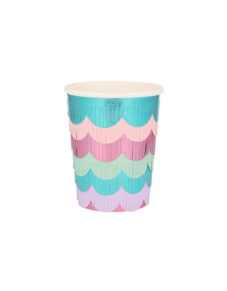 Meri Meri Mermaid Scalloped Fringe Cups. These cups designed to look like a mermaid's glittering tail, featuring 6 strips of scalloped foil fringe layered to create a sensational effect. They are crafted with a solid pink base with 6 strips of scalloped foil fringe layered on top. The layers are in delightful blues and pinks. They are simply perfect for a mermaid or under-the-sea party.