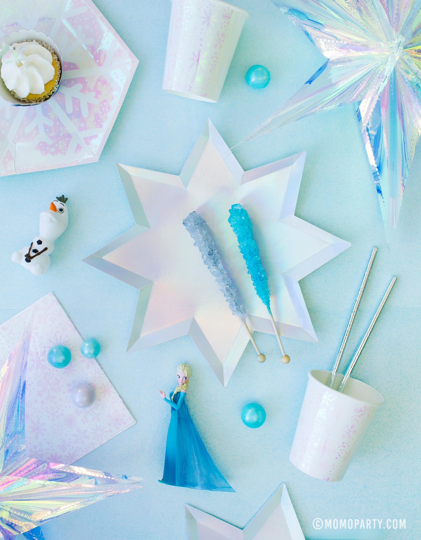 Momopartys frozen collection of Frozen themed Morden Party tablewares with Meri Meri 8-point Shining Star Plates, Daydream society Frosted Small Plates, Frosted Cups, Elsa princes and Olaf figure toy as decoration