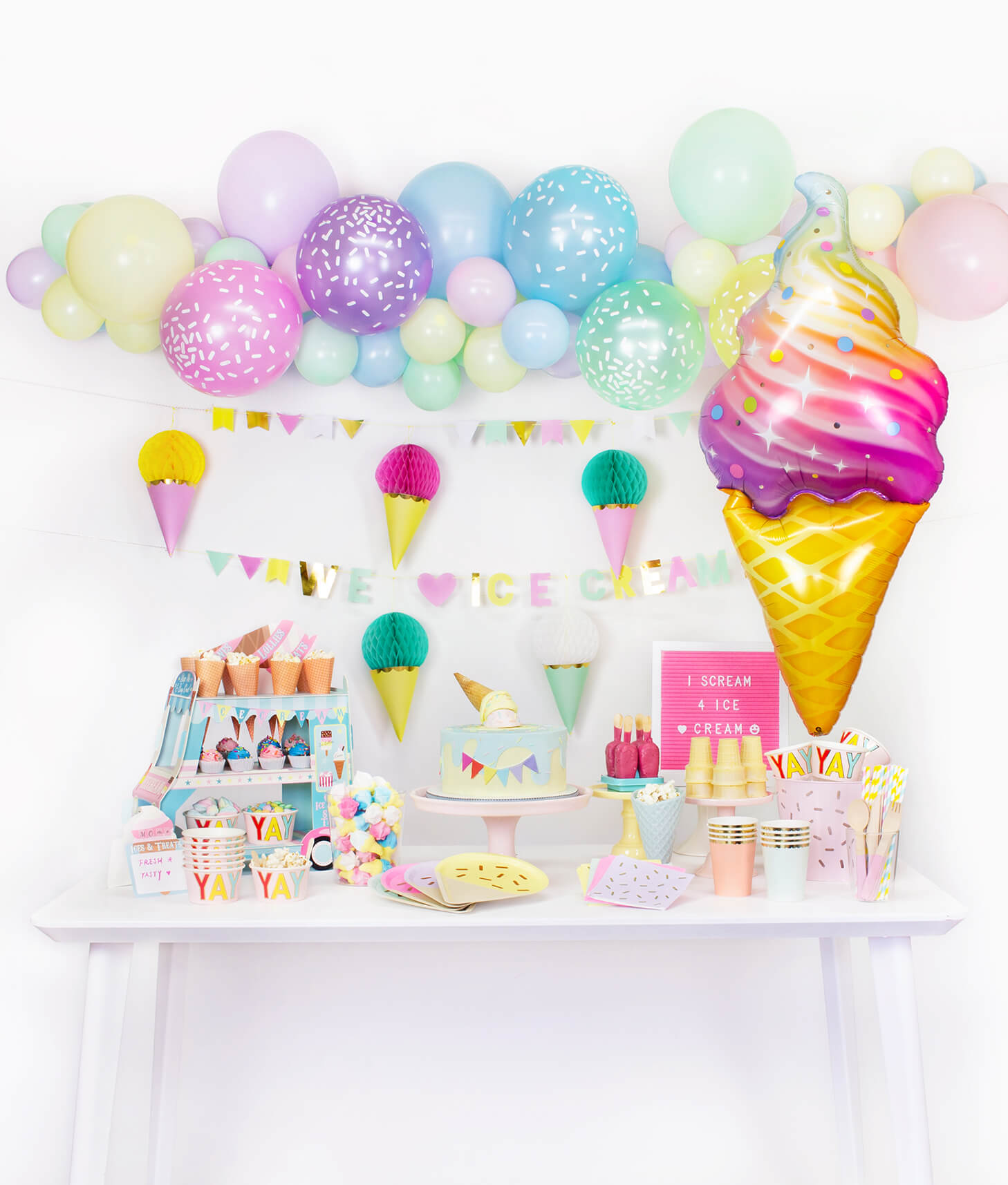 table set up and wall decoration inspiration for Summer Pastel Ice Cream Party, Birthday Party