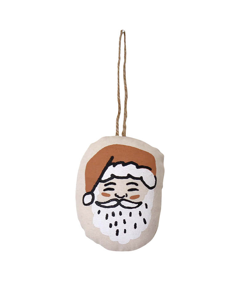Santa Ornament by Imani Collective. Size: 3 x 4 inches. This modern Plush ornament made with Natural canvas and Santa printing was sewn and screen printed by hand on natural canvas by local artisans in Kenya. This modern Santa canvas ornament is perfect for this Holiday season, christmas tree decoration, holiday small gift. Sold by Momopartys store provided modern party supplies, boutique party supplies, chic holiday party supplies and high end party supplies