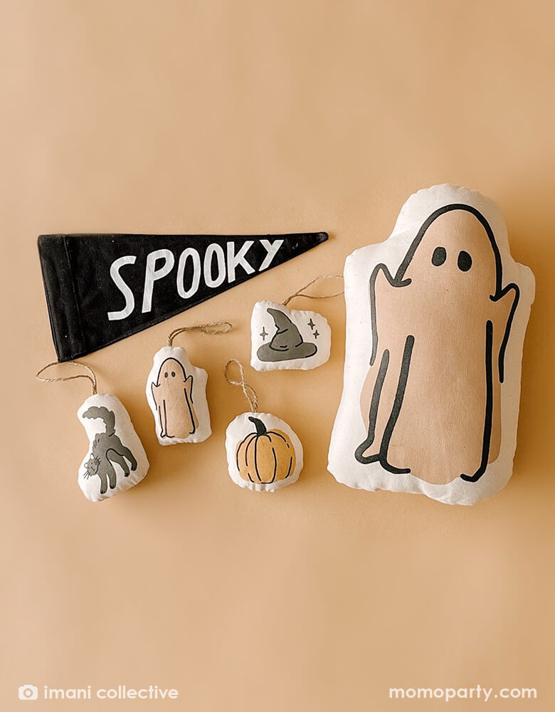 Spooky Canvas Pennant with Ghost pillow and ghost, cat, pumpkin, witch hats plush Halloween ornaments by Imani Collective. This modern canvas hang sign was sewn and screen printed by hand on natural canvas by local artisans in Kenya. It's a perfect halloween decoration for your entrance hall or your little one's playroom! Sold by Momopartys store provided modern party supplies, boutique party supplies, chic holiday party supplies and high end party supplies
