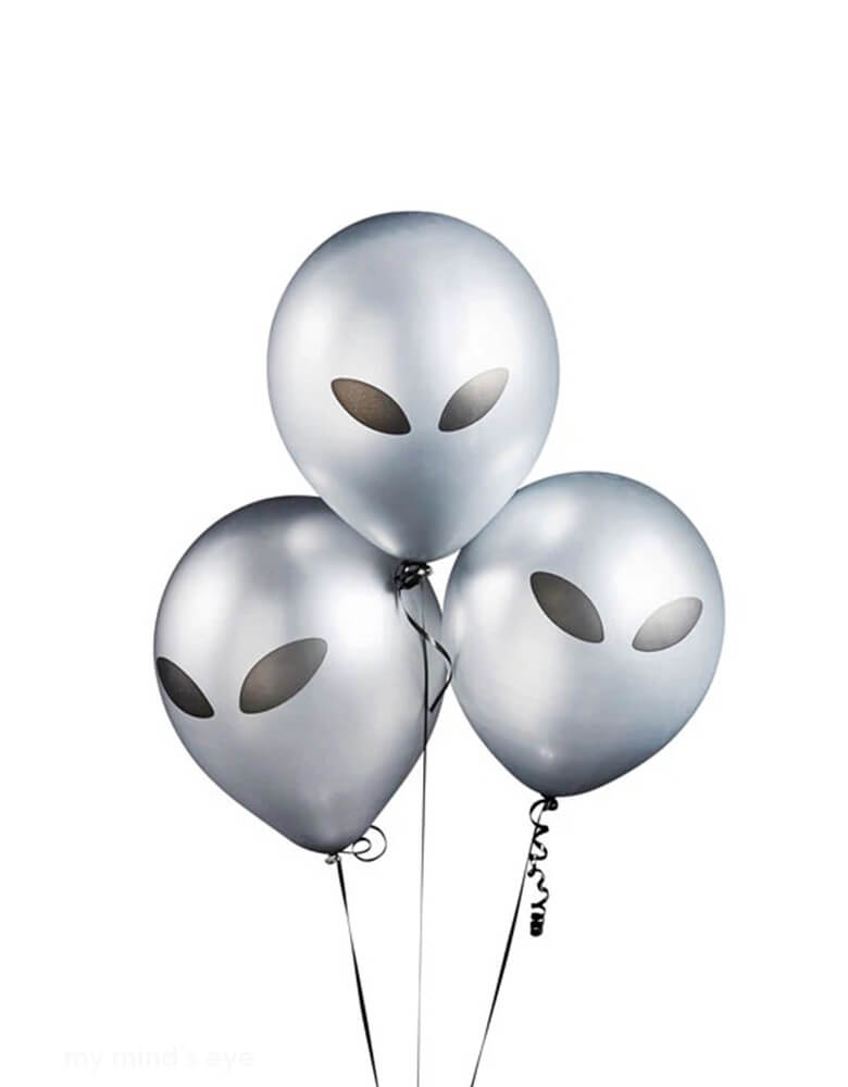 Three of Momopartys's 11" Alien Latex Balloons by Hooty Balloo. These silver alien balloons are a perfect addition to any space theme party! Transform any ordinary party into an out-of-this-world experience with these stellar silver alien balloons! Guaranteed to add a touch of intergalactic charm to your space-themed shindig!