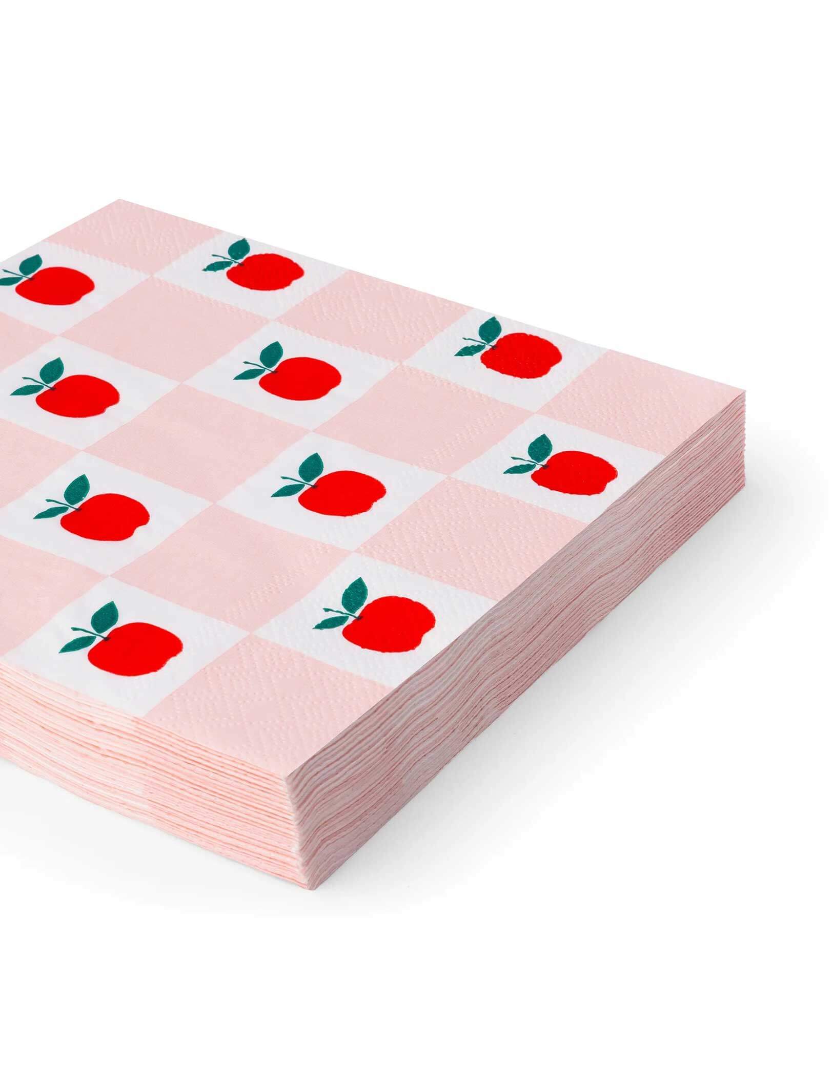 Momo Party's 6.5" Apple & Pink Checker Large Napkins by Bonjour Fete. Comes in a set of 20 napkins, get ready for back-to-school fun with these large napkins adorned in pink stripes, classic checkers, and vibrant red apples highlighted with shiny gold foil accents. They're perfect for your child's back to school party, first day of school celebration or a teacher appreciation event!