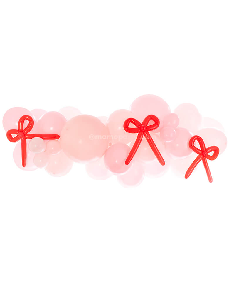 Momopartys presents the Bow-tiful Pink Balloon Cloud Kit, an assortment featuring 16", 11”, and 5” latex pink-colored balloons, along with red long balloons crafted into charming bow shapes. Create an enchanting balloon display with this kit, perfect for adding a touch of elegance to your celebration, Such a cute idea for elevating your Valentine's celebration or Galentine's Day with your besties
