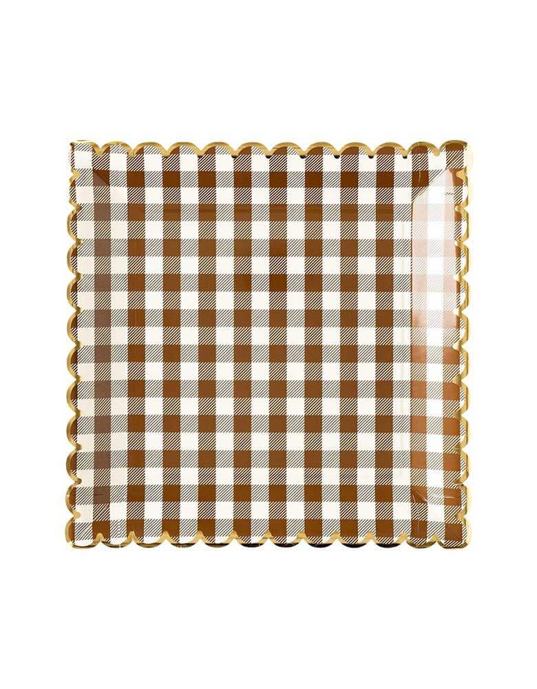 Momo Party's 10"  Brown Gingham Scalloped Plates. This harvest tabletop essential adds a pinch of charm to any meal. Elevate your tabletop game with this chic and playful design.