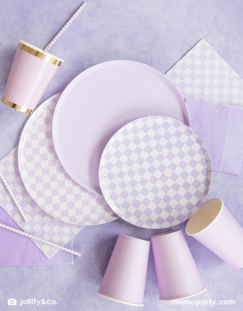 Jollity & Co Check It! Check It! Purple Checkered Plates from Checkered Collection with Shades Lavender Dinner Plates from The Shade Collection, and checkered print dessert plates, large napkins and cups. These modern partyware are perfect for a mixing and matching with your favorite party pieces or used as stand-alone items.