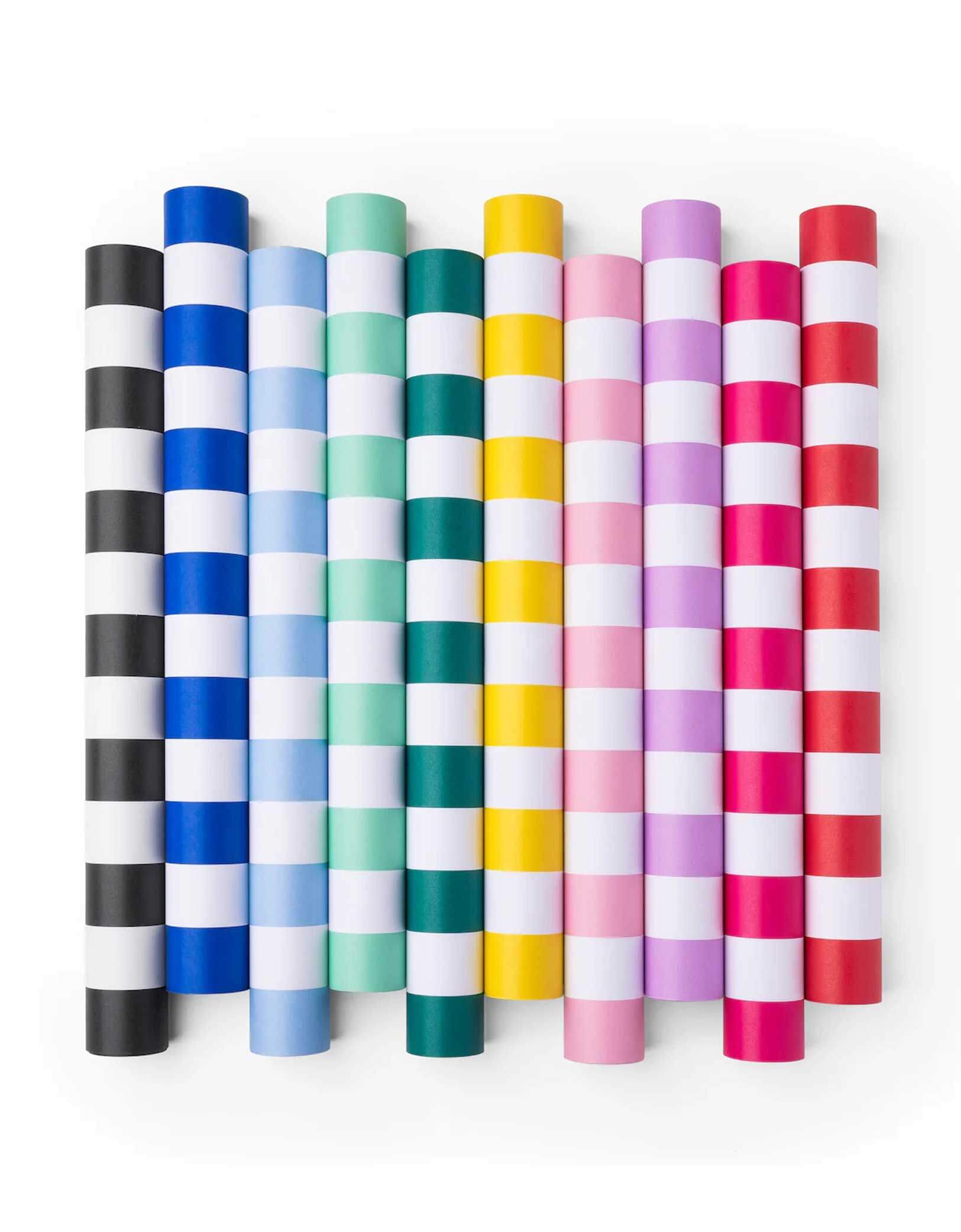 Momo Party's 19.5" x 150" Cabana Stripe Table Runner Collection by Bonjour Fete. Made with FSC-certified paper, these  striped table runners come in multiple colors including sky blue, dark blue, yellow, mint, emerald green, lilac, pink, red, yellow, black and more. Made from top-quality fabric and featuring bold, these stylish striped table runner are perfect for brightening up any party.
