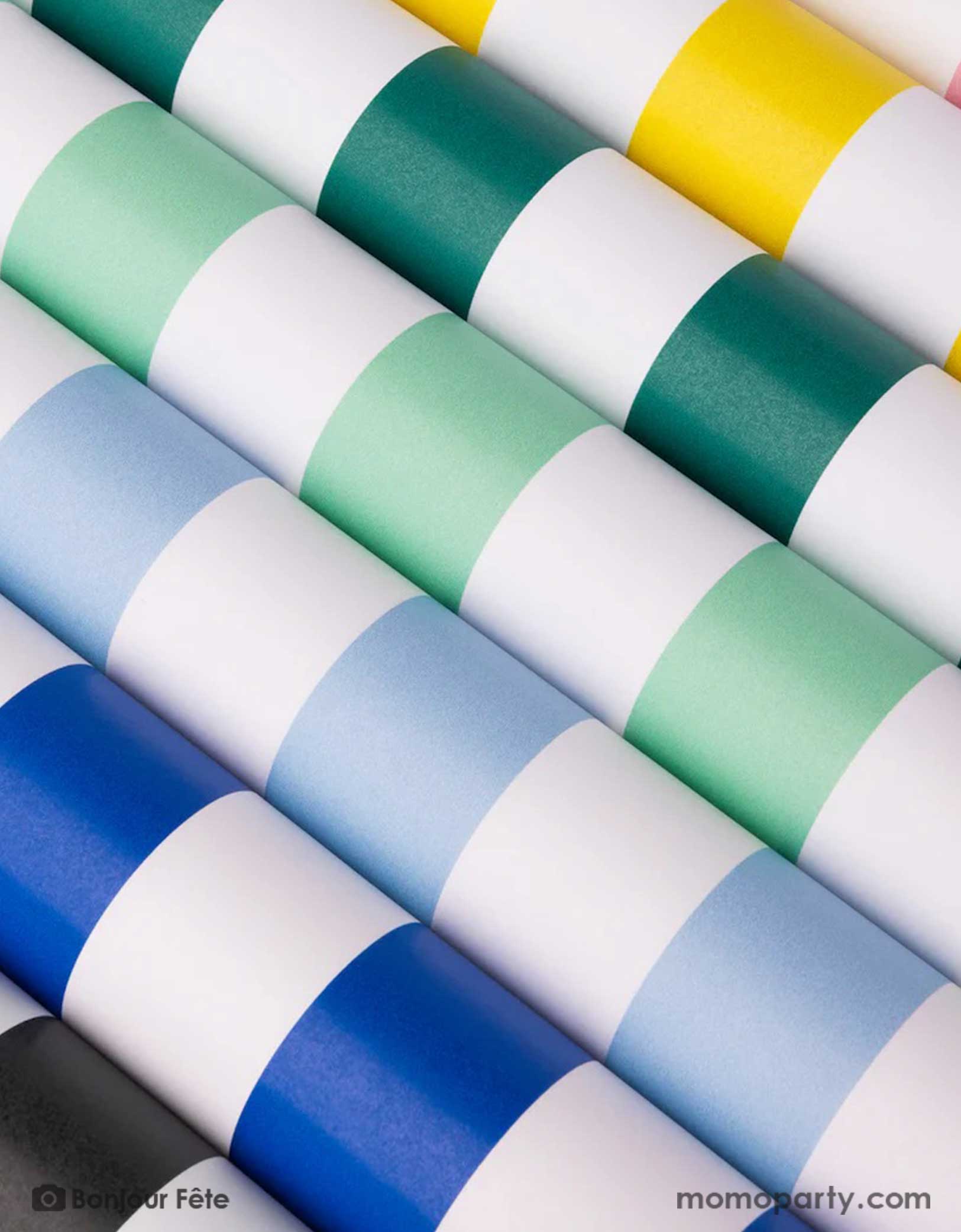 Momo Party's 19.5" x 150" Cabana Stripe Table Runner Collection by Bonjour Fete. Made with FSC-certified paper, these  striped table runners come in multiple colors including sky blue, dark blue, yellow, mint, emerald green, yellow, black and more. Made from top-quality fabric and featuring bold, these stylish striped table runner are perfect for brightening up any party.