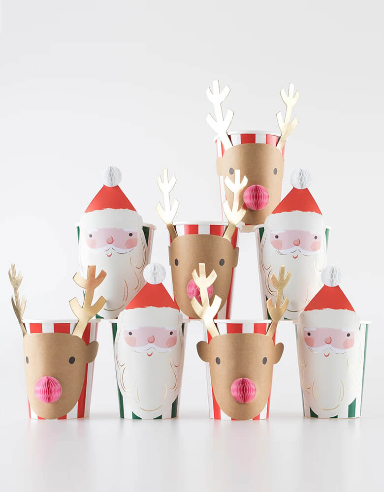 Momo Party's 9 oz Christmas Santa and Reindeer Honeycomb Cups by Meri Meri. These sensational striped cups feature none other than Santa and his reindeer friends! The honeycomb details add a fabulous 3D effect, and they're perfect for festive drinks or for party favors, treats and snacks. They also make wonderful cups to leave out a drink for a thirsty Santa and his reindeer on Christmas Eve!