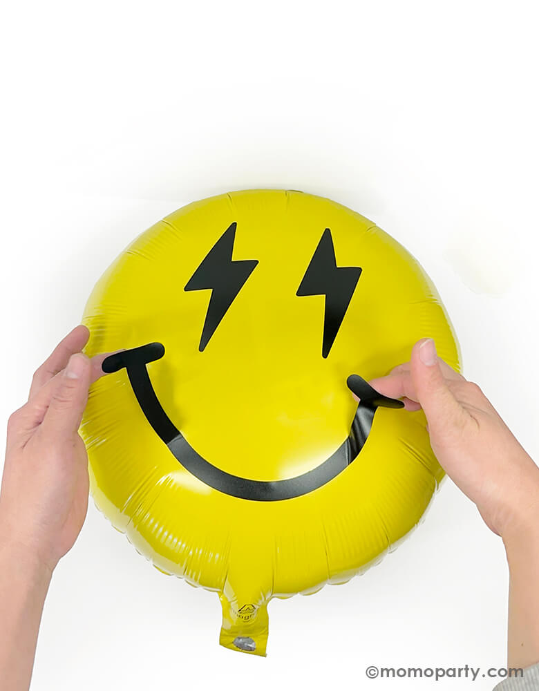 Discover the Cool Dude Smiley Foil Balloon Kit by Momopartys. This kit includes an 18" yellow round foil balloon adorned with lightning bolt eyes and a smiley face vinyl sticker. Simply inflate the round foil balloon and apply the stickers to the center to create a super rad decoration! Perfect for a boy's 'One Happy Dude' themed first birthday, a 'Two Cool' themed second birthday party, 'Ten Rad Years' 10th birthday celebration, or any modern kids birthday party and celebration.