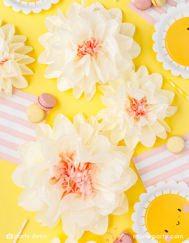 A cheerful table decoration features Momopartys's sunflower sunny scallop edged round plates, pink and white striped large napkins and cream tissue paper flower decorations, with some macarons and sweet desserts, this makes a great idea for kid's "You're my sunshine" themed party or any "Good Vibes" themed celebration!