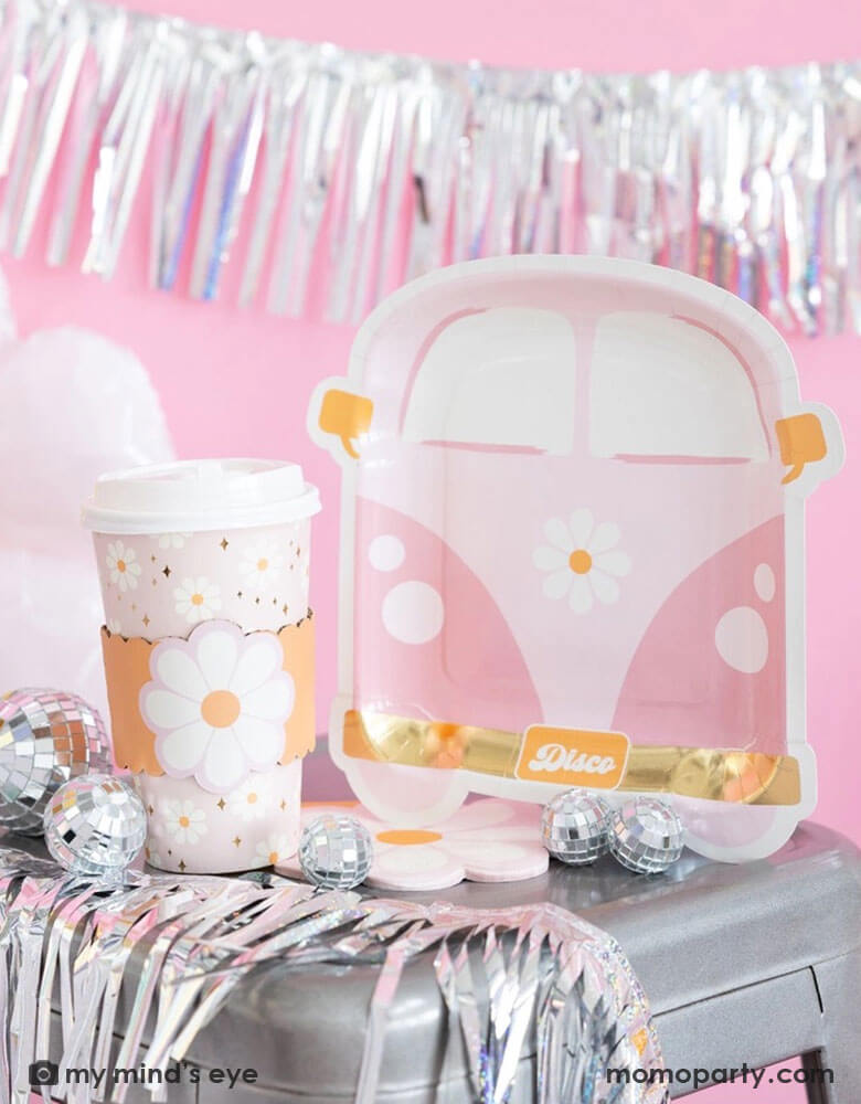 A retro hippie inspired party table featuring Momopartys's