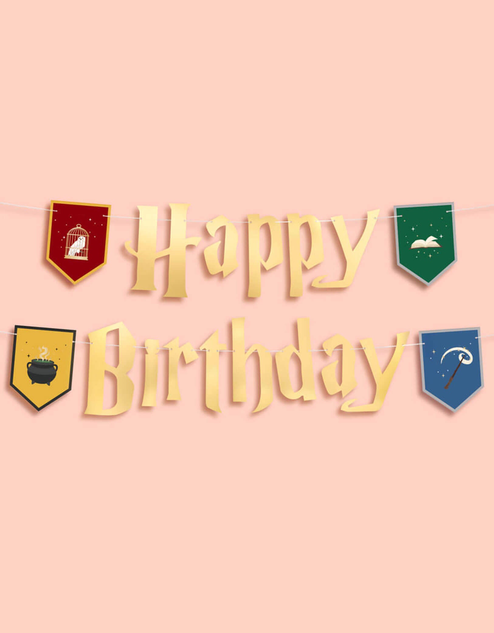 Momo Party's 5' Harry Potter themed Wizard Birthday Party Banner by Xo, Fetti. Inspired by the Hogwarts in Harry Potter, this party banner features "Happy Birthday" letters with red, green, blue and  yellow Harry Potter colored house crest shaped pendants with designs of an owl, a wand, a spell book, and a cauldron.  It's perfect for kid's Harry Potter themed birthday party!