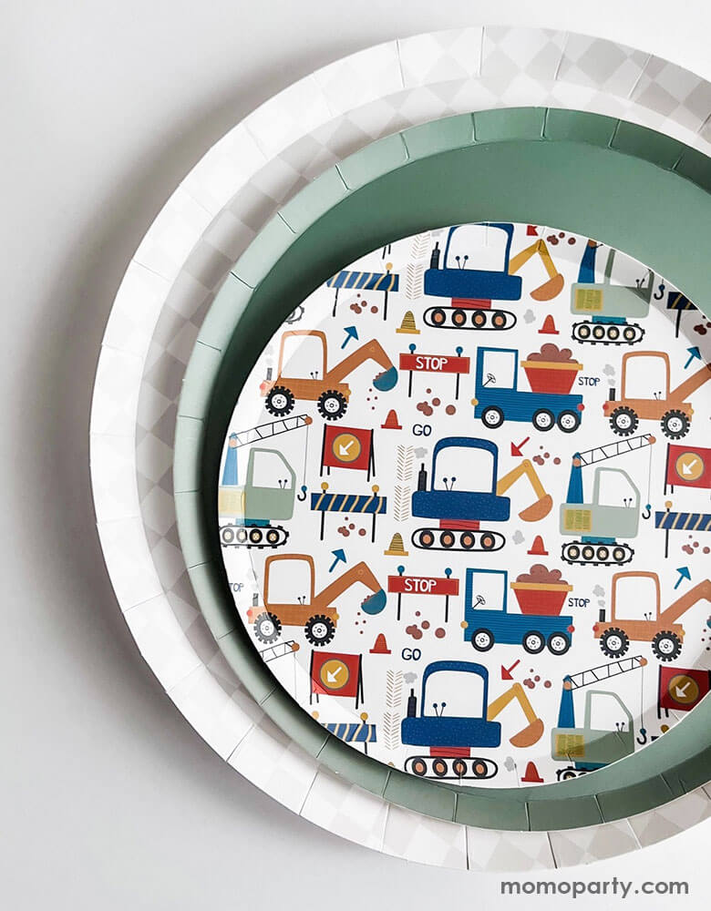 A festive kid's construction themed party placeset idea featuring Momopartys's 10.25" light grey checkered dinner plate, 9" olive green large plate and a round side paper plate with motif of various construction trucks in multiple colors by Josi James. This set is perfect for preschool boy's construction themed party, a fun dirty-3rdty themed birthday bash!