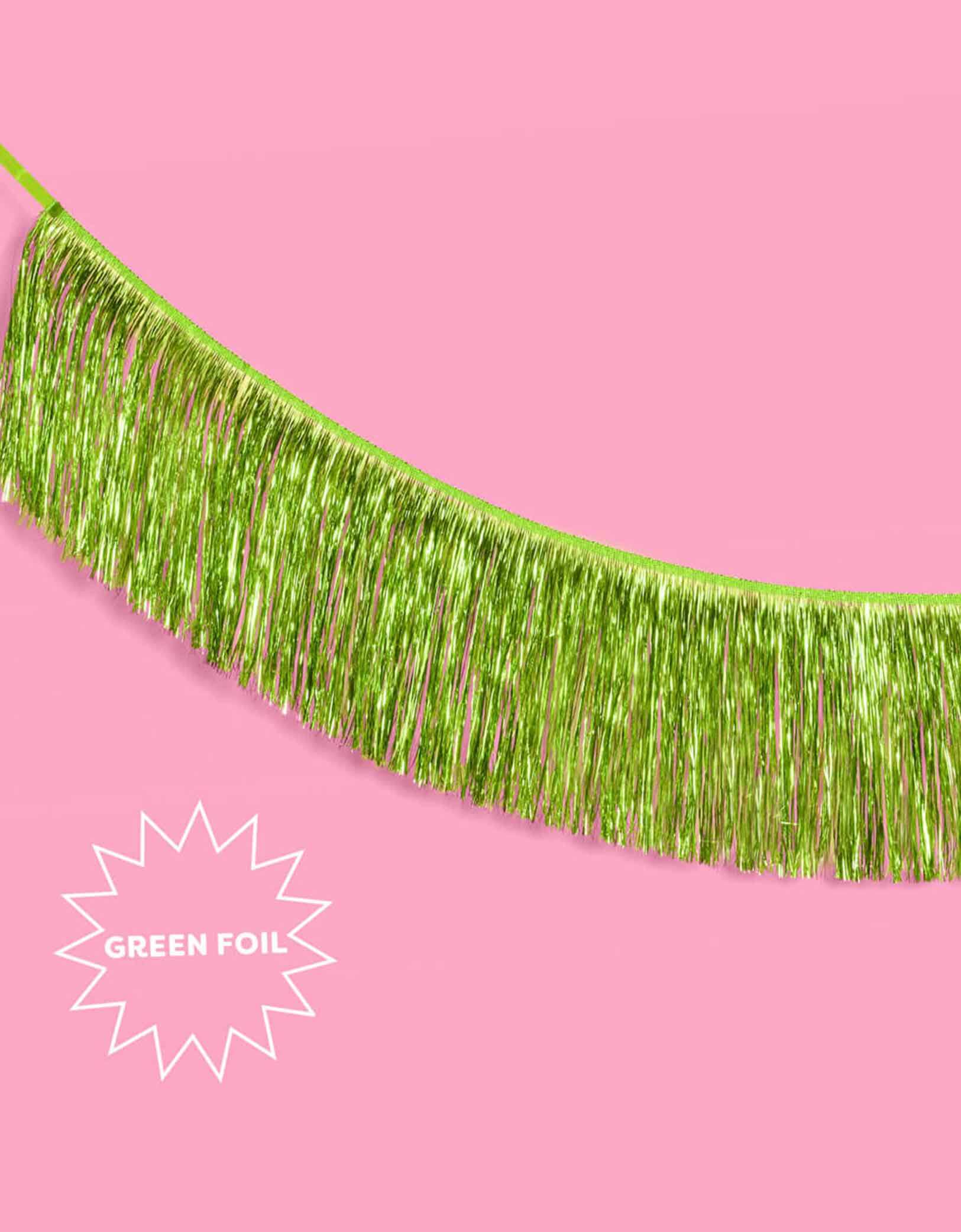 Momo Party's 4.43 feet Lime Green Fringe Garland by Xo, Fetti.  Perfect for any celebration, it'll add just the right touch of shimmer. You'll love it for Wicked themed celebration or kid's safari, dinosaur themed birthday parties!