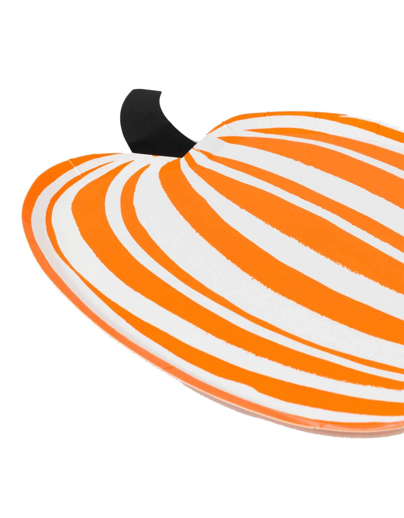 Momo Party's pumpkin-shaped plates with orange and white stripes by Meri Meri on a white background. Momopartys's 7.875" x 10.125" Stripe Pumpkin Paper Plates featuring two pumpkins, one black and white striped, the other orange and white striped by Meri Meri on a white background.