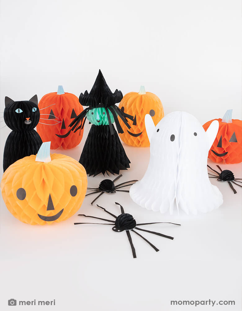 Momo Party's Halloween Character Honeycomb Decorations by Meri Meri. These large 3D honeycomb characters including a ghost, a witch, a black cat, three spiders and four pumpkins with faces, will add spectacular scary decorative fun to your Halloween party table, mantel or porch. They are crafted from tissue paper honeycomb, with silver paperclips included to hold the honeycomb open. Use them year after year to thrill and chill!