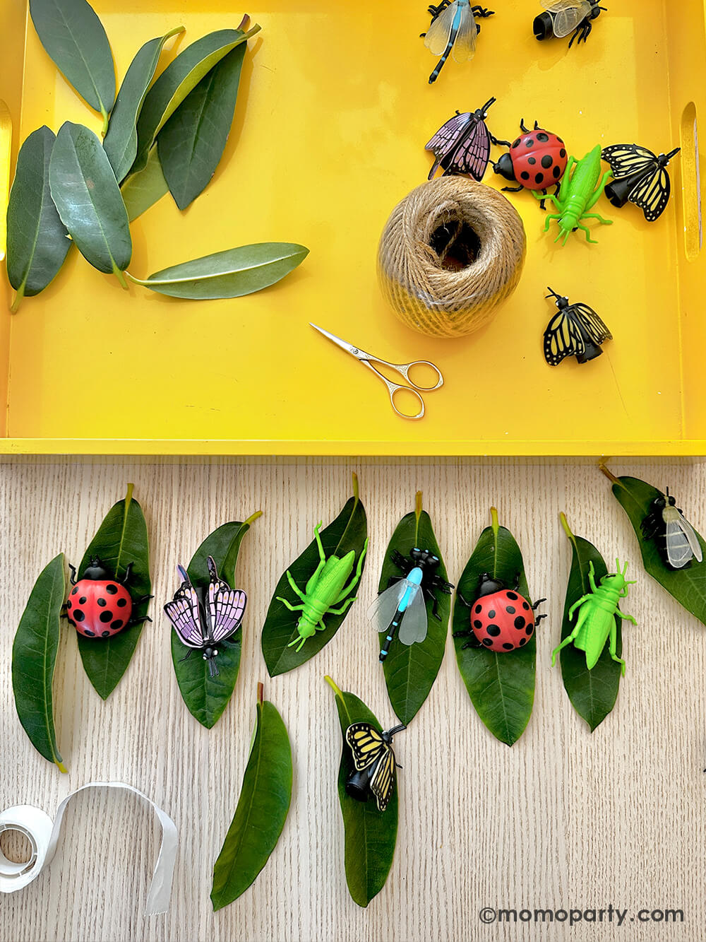 A diy project using Momopartys's various insect finger puppets and real leaves as decoration to party favor bags for kid's bug insect themed birthday party.