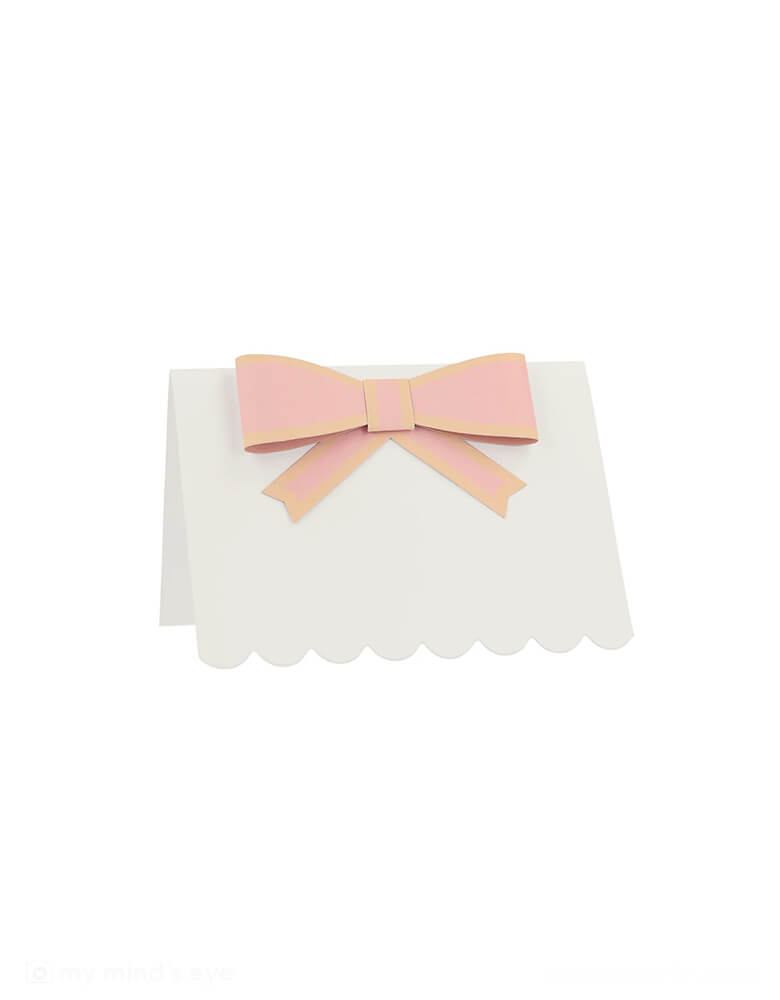 A close up of Momopartys's 3.5"x 2.5" Pastel Bow Place Card by Meri Meri. Featuring pretty pastel colors in 8 different colors, including pale pink, pink, dark pink, ivory, yellow, peach, mint and blue, each of the place card has a 3D paper bow on them, making this an elegant yet darling addition to your tableset.