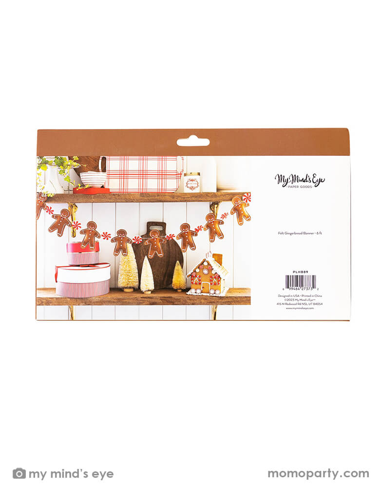 The back side of My Mind's Eye Puffy Felt Gingerbread and Candy Banner in the package, now available at momopartys.shop. This adorable Puffy Felt Gingerbread & Candy Banner, with its whimsical gingerbread man and candy canes. this is a simple gingerbread house building or cookie decorating party!