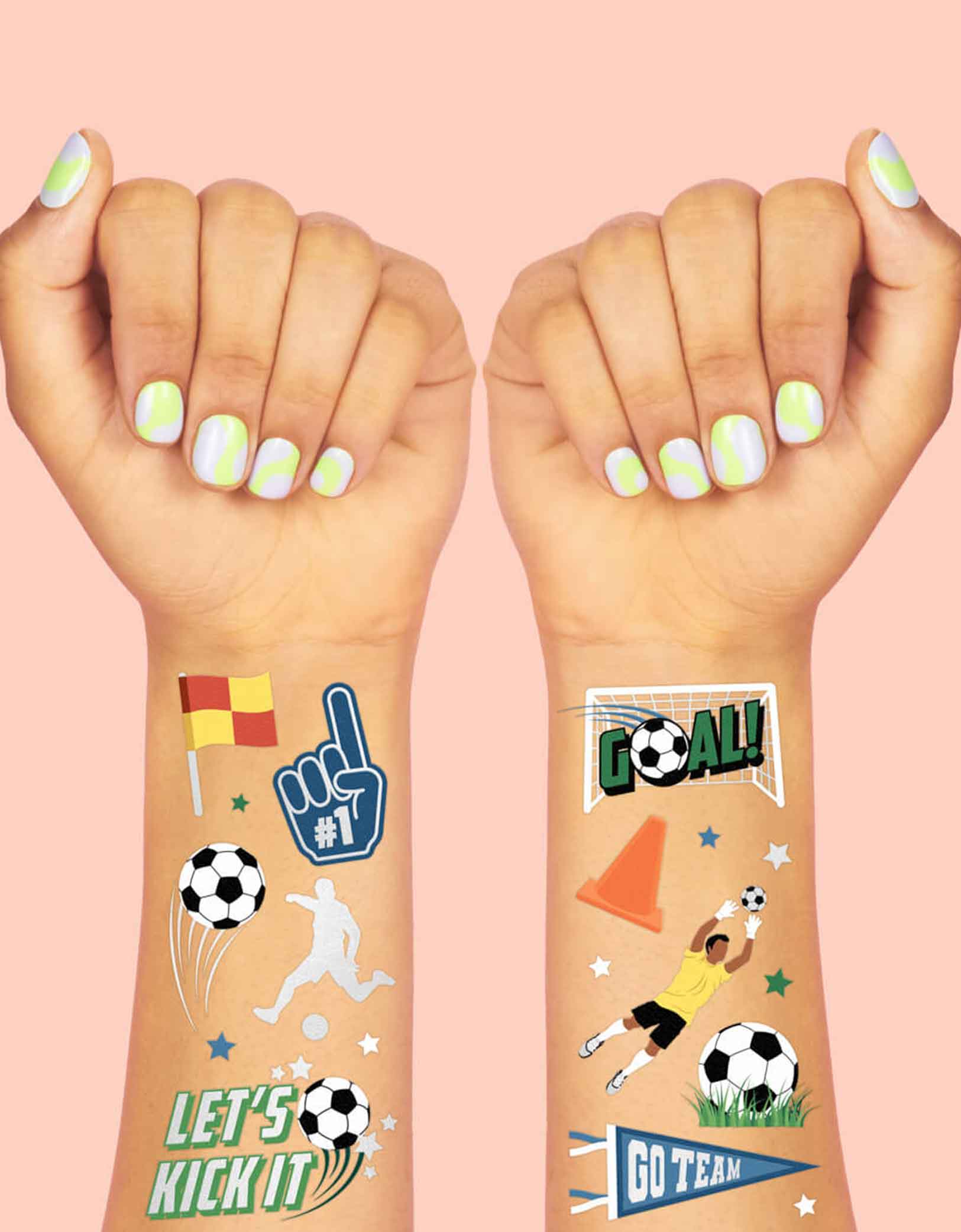 Two arms decorated with Momopartys's Soccer Kids Temporary Tattoos by Xo, Fetti. Comes in a set of 54 tattoos in soccer themed designs including soccer balls, soccer jerseys, training cones, soccer players, these soccer temporary tattoos are great for kid's soccer themed birthdays or a watching parties.