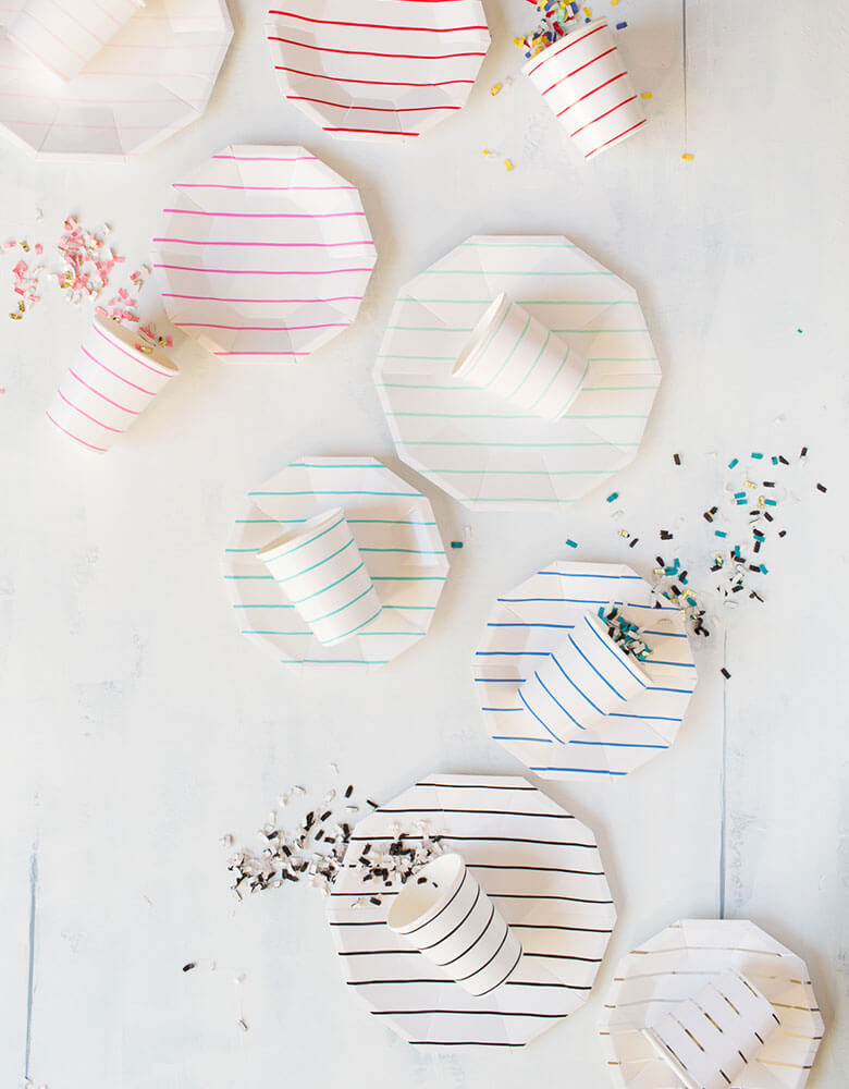 Daydream Society Frenchie Stripes Collection with party cups, plates, and napkin in different colors  spread out