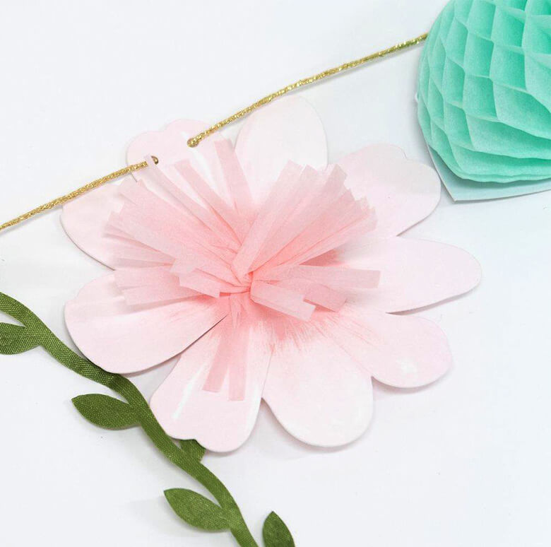 Details of Meri Meri Fairy Garland of The  a pink flower made by sweet tissue paper tassels