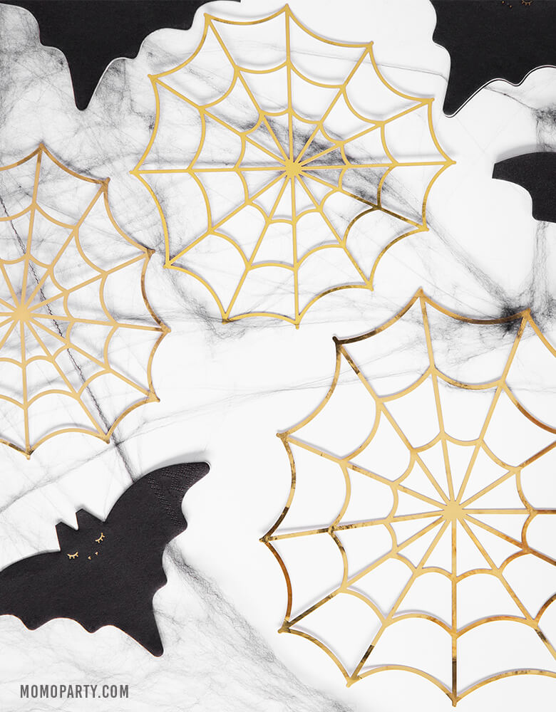 Table set up for a halloween party with Party Deco Bat Napkins and Gold Spiderweb Decorations on the marble tabletop. Morden and high quality party tableware sell by party online store, party boutique online store, party supplies at momopartys.shop