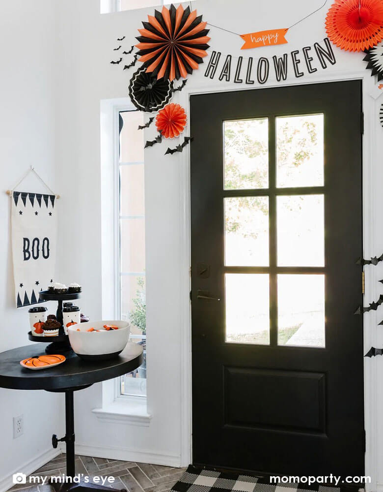 Halloween-Doorway-Decorations featuring My Mind's eye glitter bats With score lines, these bats become dimensional and are ready to take fly at a moments notice, creating a truly terrifying space this Halloween
