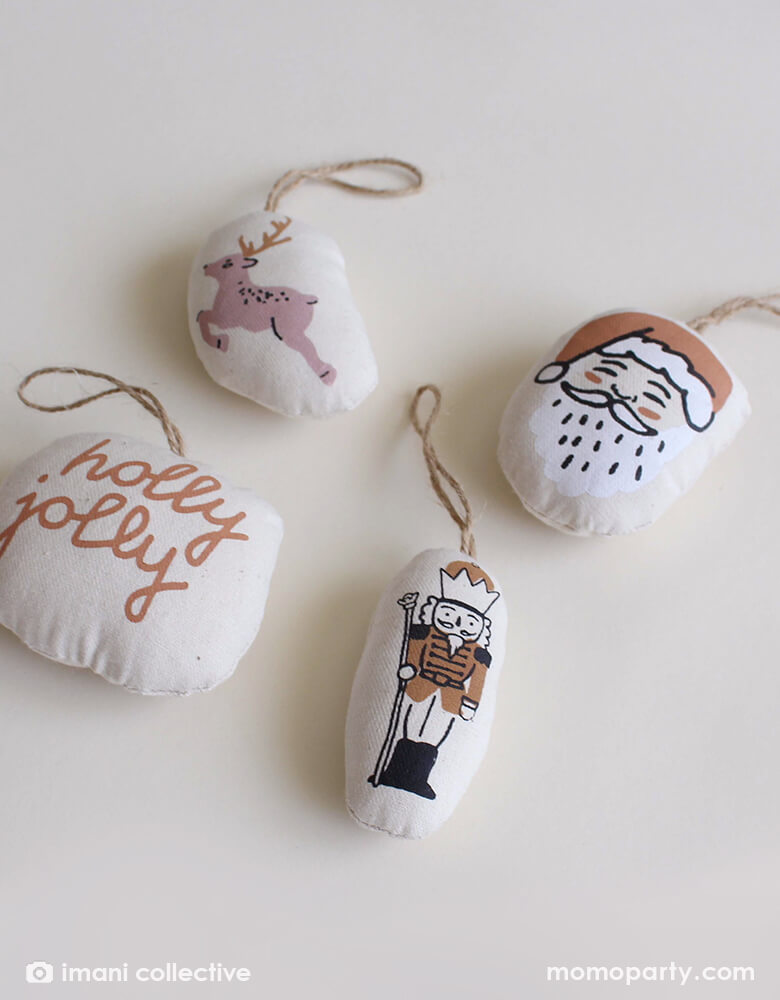 Modern Plush ornament by Imani Collective. These modern Natural canvas with Nutcracker, santa, deer and holly jolly text printing was sewn and screen printed by hand on natural canvas by local artisans in Kenya. This modern Unique canvas ornament is perfect for this Holiday season, christmas tree decoration, holiday small gift, Nutcracker lover. Sold by Momopartys store provided modern party supplies, boutique party supplies, chic holiday party supplies and high end party supplies
