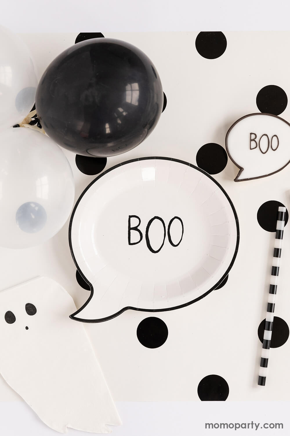 Happy Haunting Ghost Shaped Napkins. with Happy Haunting Boo Small Plate and same shaped boo cookies, black stripe straw, and black and white latex balloons, over the Cream with Black Dots Table Runner. Keep the spooky vibes rolling with these BOOtiful ghost shaped dinner napkins! This darling little ghost party supplies will make every "boo"s day in halloween party