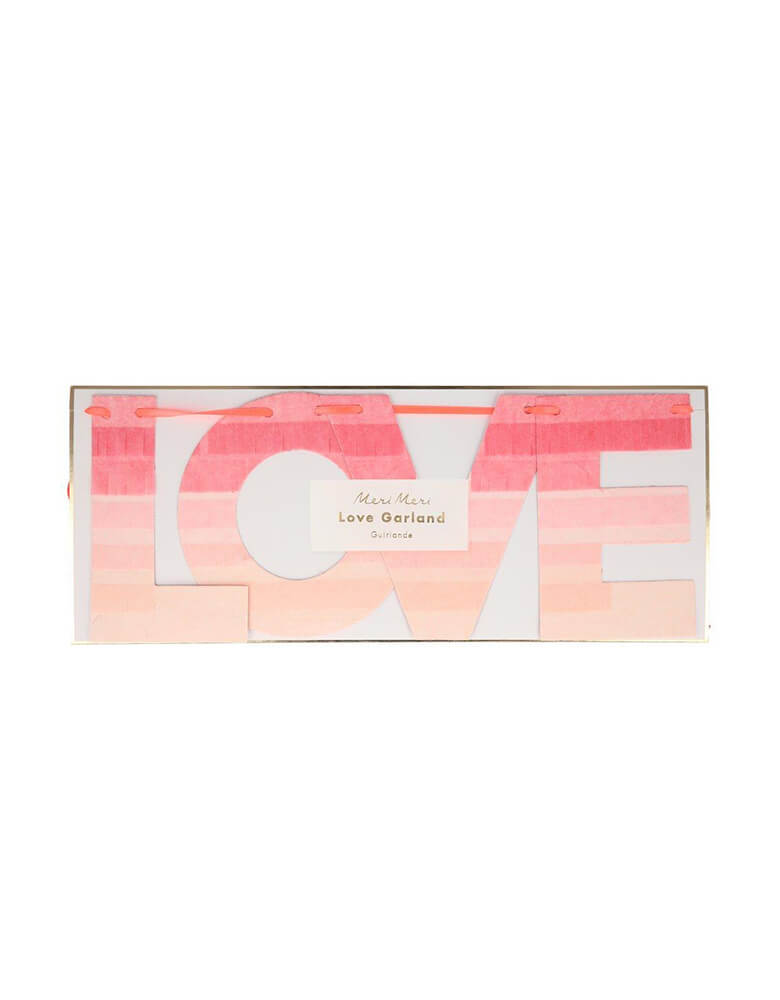 Meri Meri Ombre Love Garland with fringed tissue paper, with each letter having colors in red, peach and pink to achieve an ombre effect. Perfect for a Valentine's Day or Galentine's Day celebration 