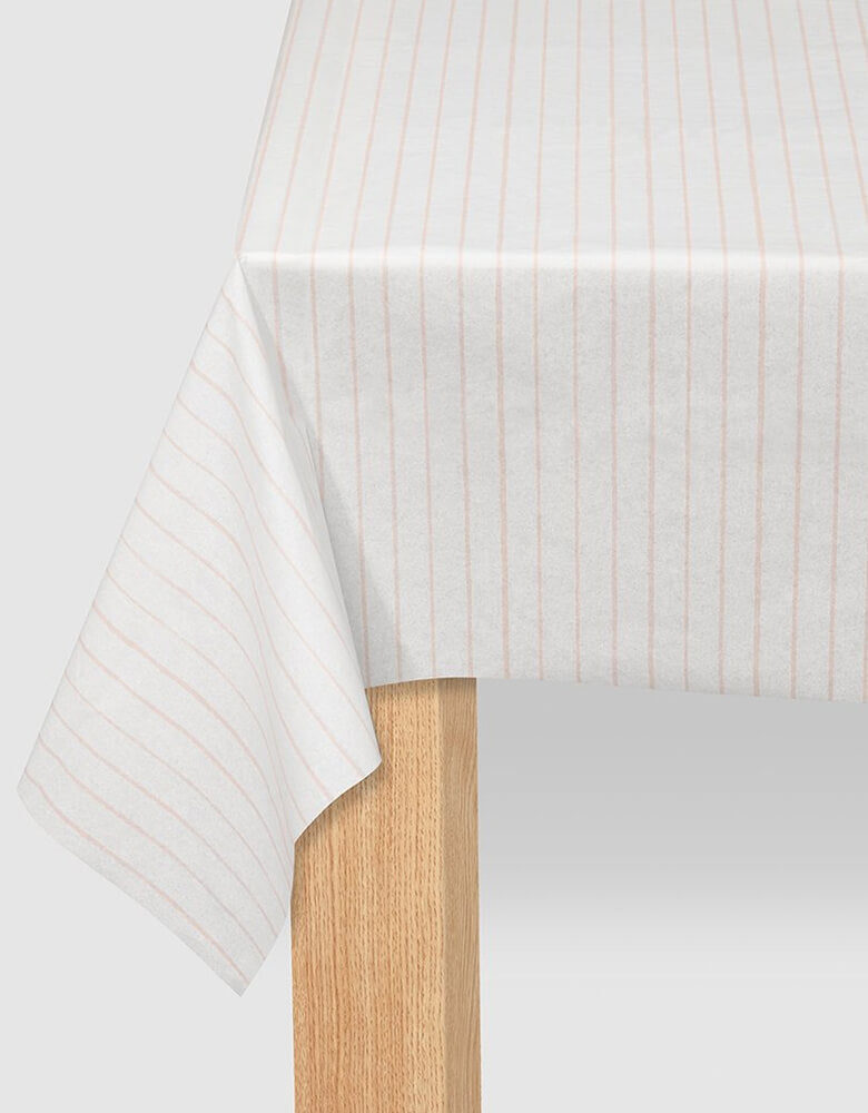 Coterie - Pale Pink Pinstripe Tablecloth. Made from a super soft paper, this modern pale blue pinstripe tablecloth does double duty: protecting surfaces and adding a great design touch to your tablescape. 