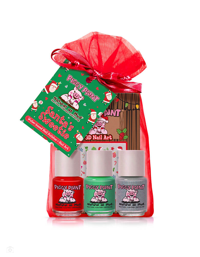 Piggy Paint Nail Polish Gift Set - Santa's Sweetie.   Add a little Holiday cheer to your little one's hands with this festive Christmas themed nail polish set which includes 3 fun and safe nail polishes  and one sheet of Christmas Cutie 3D Nail Art sticker in a Red Sheer Organza Bags. There are Non-toxic, odorless & safe for all ages. Cruelty-free + Vegan and Made in the USA. These are prefect gift and stocking stuffer for holiday. Morden and high quality party boutique online store at momopartys.shop