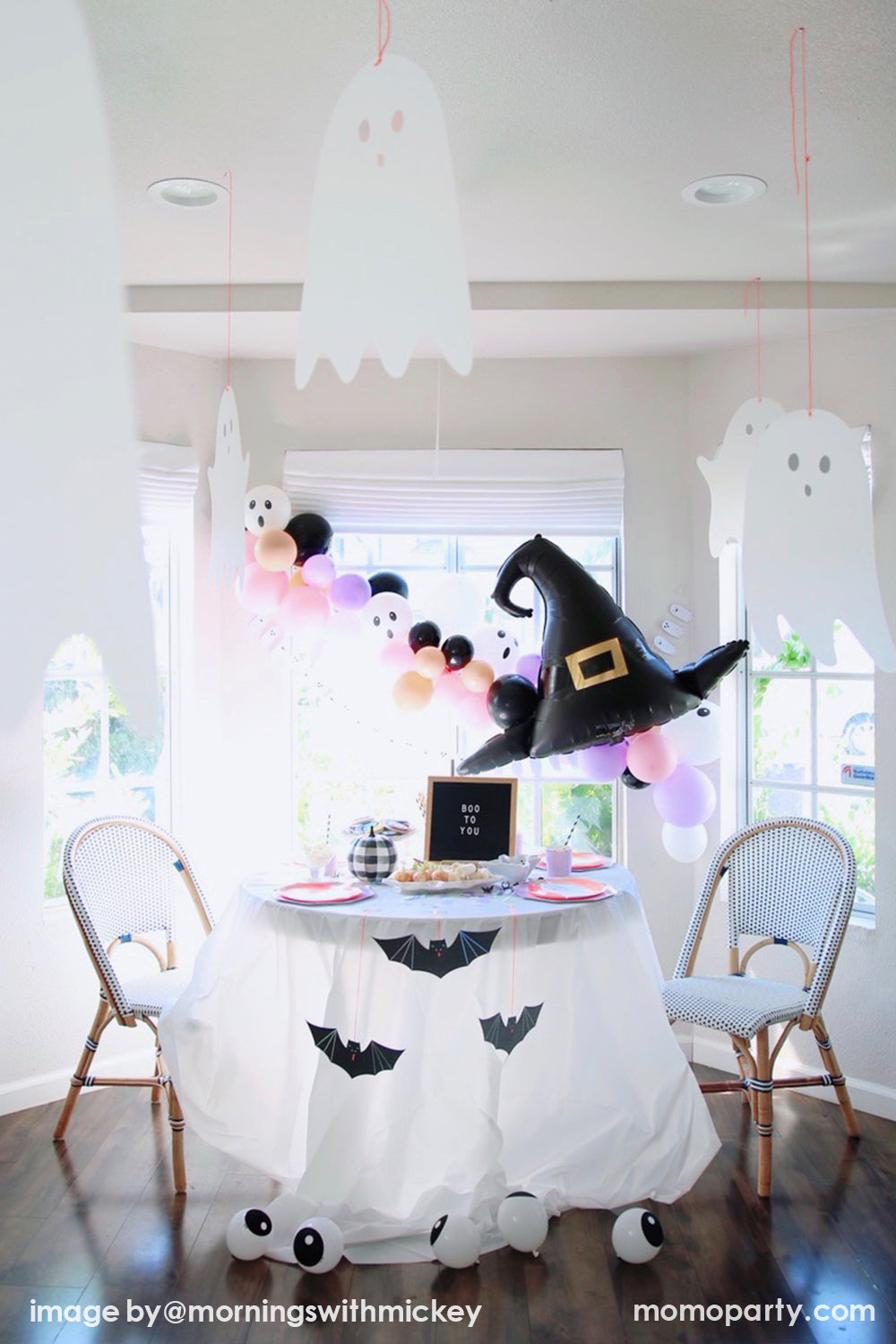 Halloween party morning Table set up with Momopartys boo to you balloon cloud, witch hat foil balloon, 